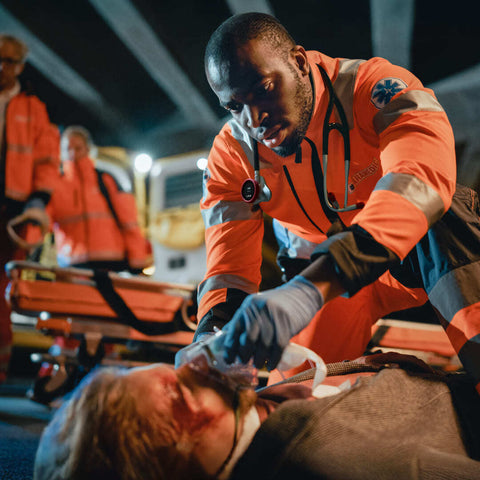 Paramedic assesses patient with the Eko CORE 500™ Digital Stethoscope